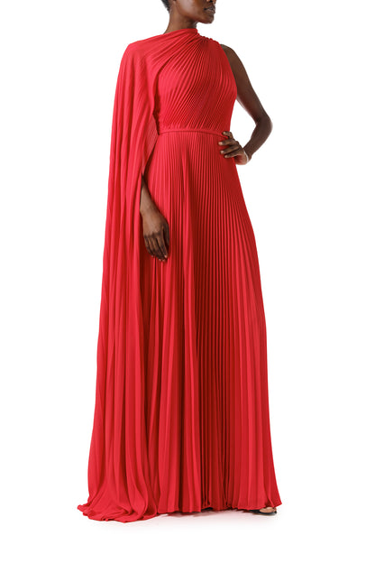 Monique Lhuillier Fall 2024 One shoulder gown with attached, asymmetric-pleated cape in Scarlet Georgette - side.