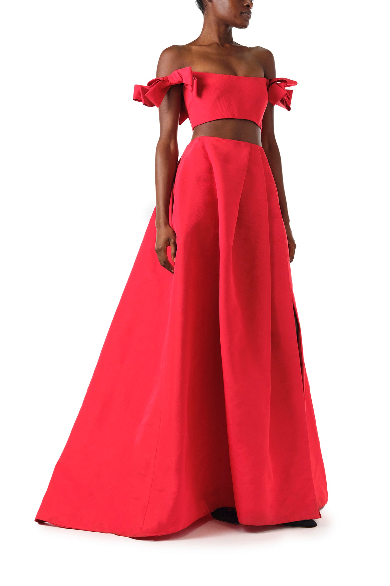 Monique Lhuillier Fall 2024 scarlet red faille pleated ballgown skirt with high front slit and pockets - side.