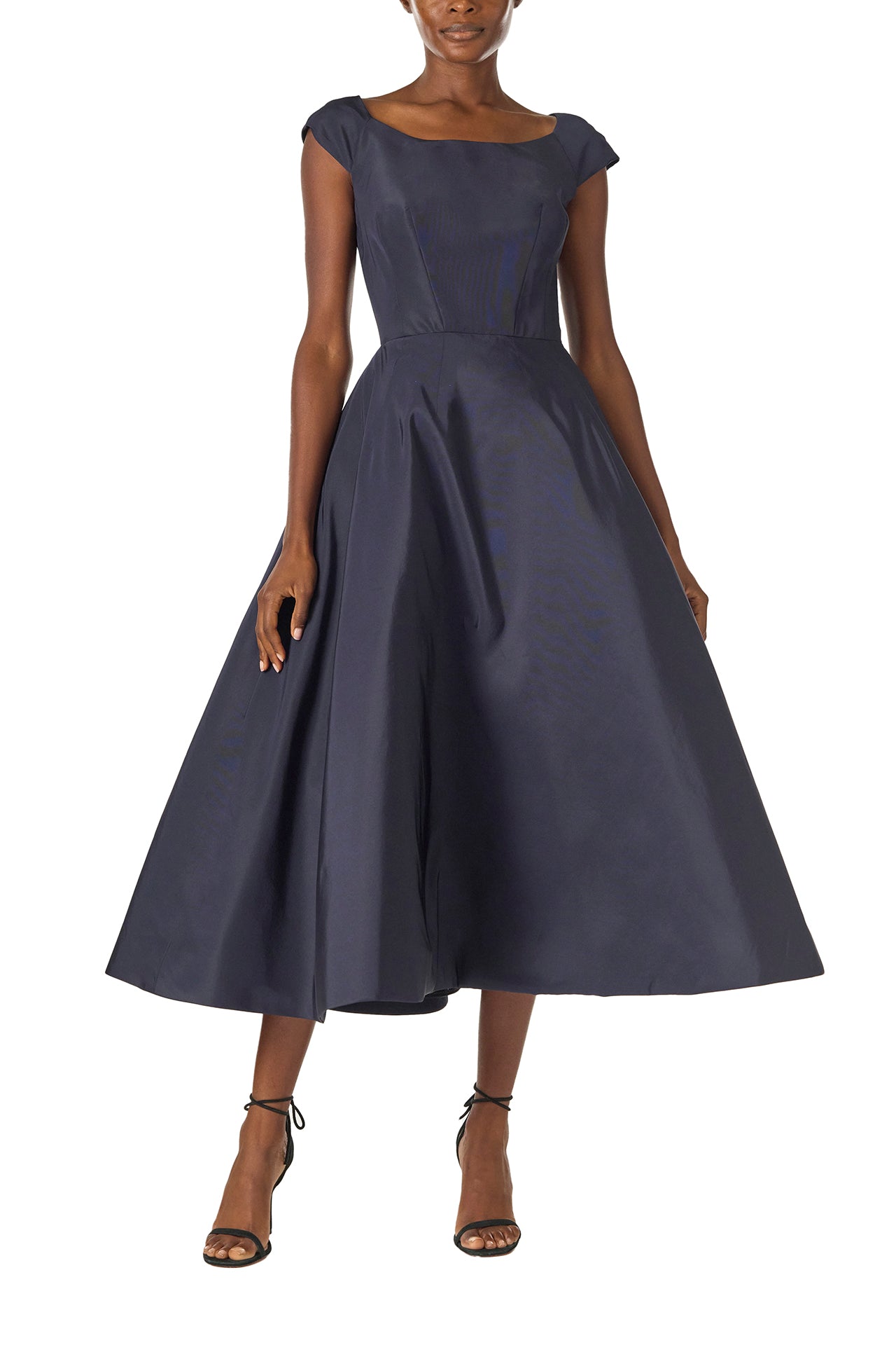 Monique Lhuillier Fall 2024 Bateau neck, cap sleeve dress with full tea length skirt in night sky silk faille - front.
