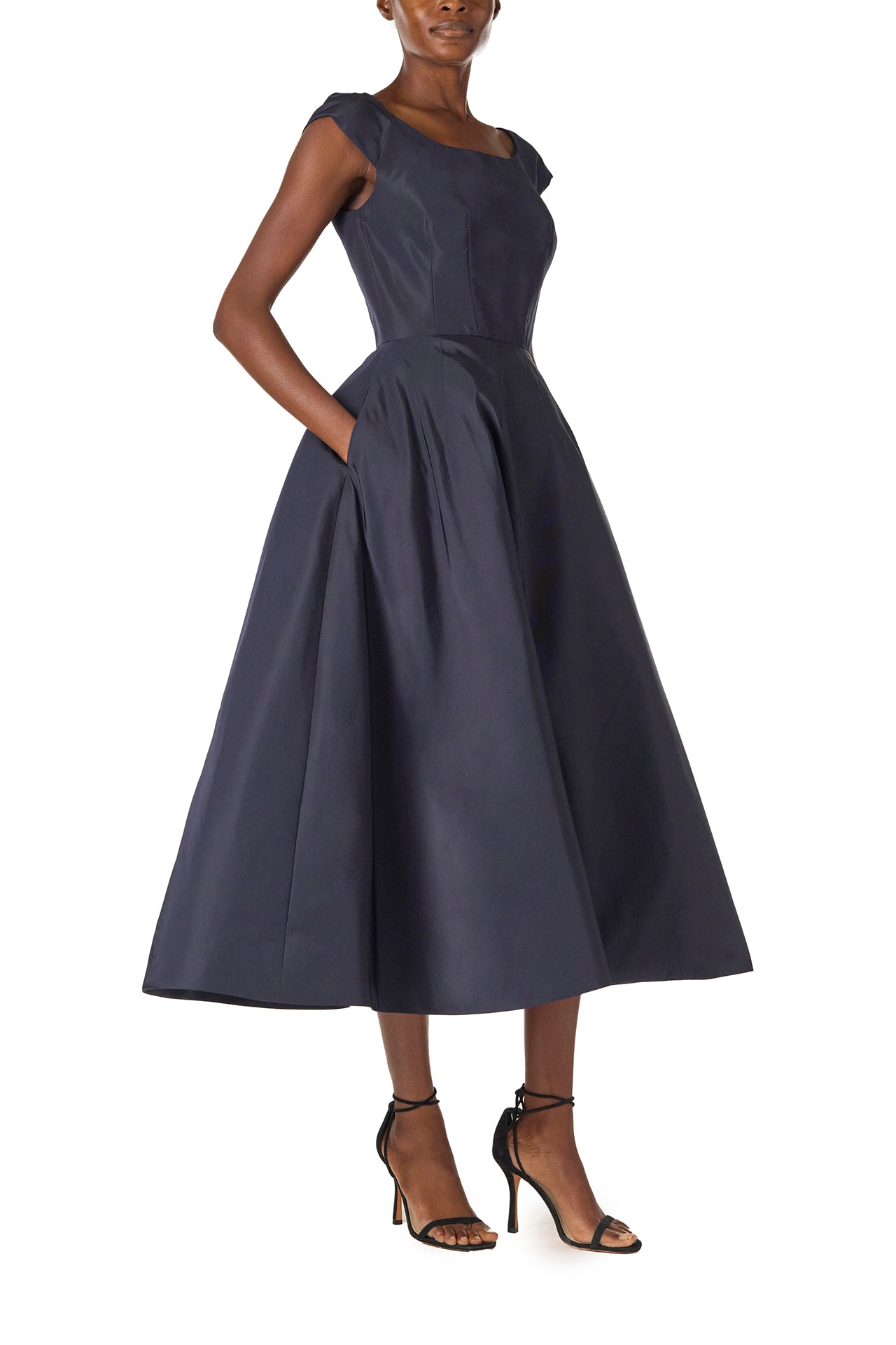 Monique Lhuillier Fall 2024 Bateau neck, cap sleeve dress with full tea length skirt in night sky silk faille - side with pockets.