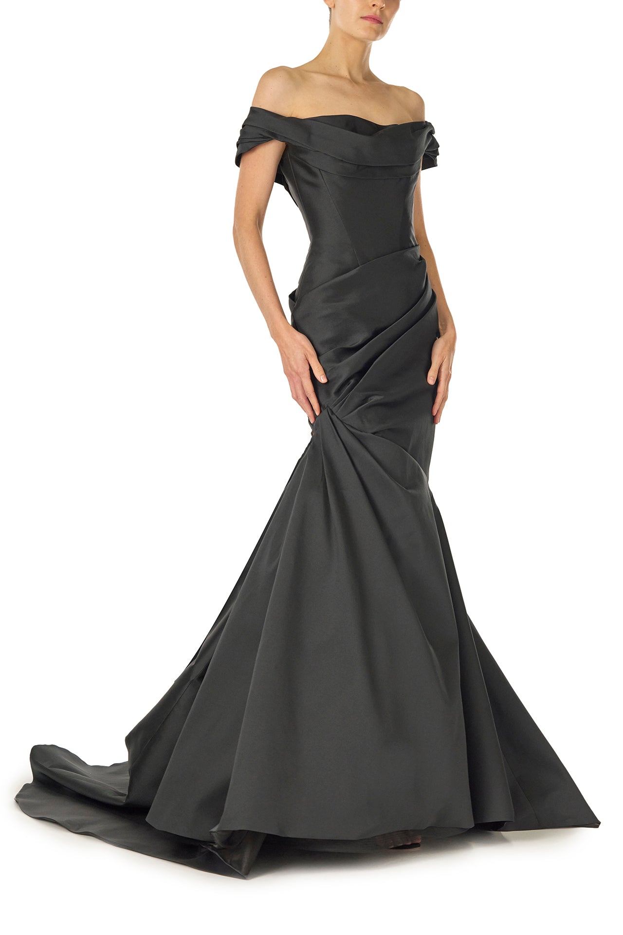 Monique Lhuillier Fall 2024 off-the-shoulder, draped gown with trumpet skirt and low back - side.