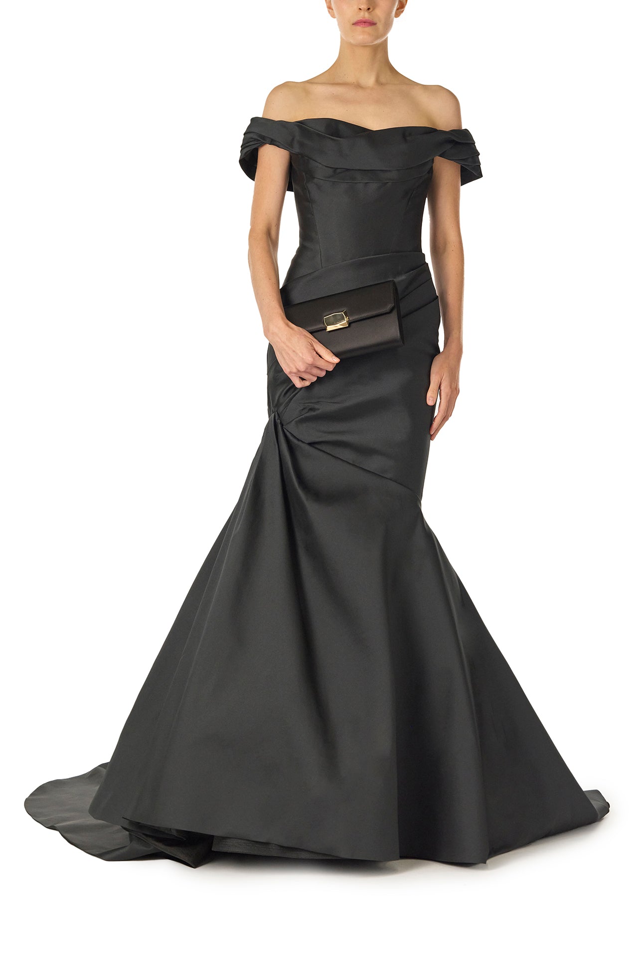 Monique Lhuillier Fall 2024 off-the-shoulder, draped gown with trumpet skirt and low back - front with Delphine clutch.