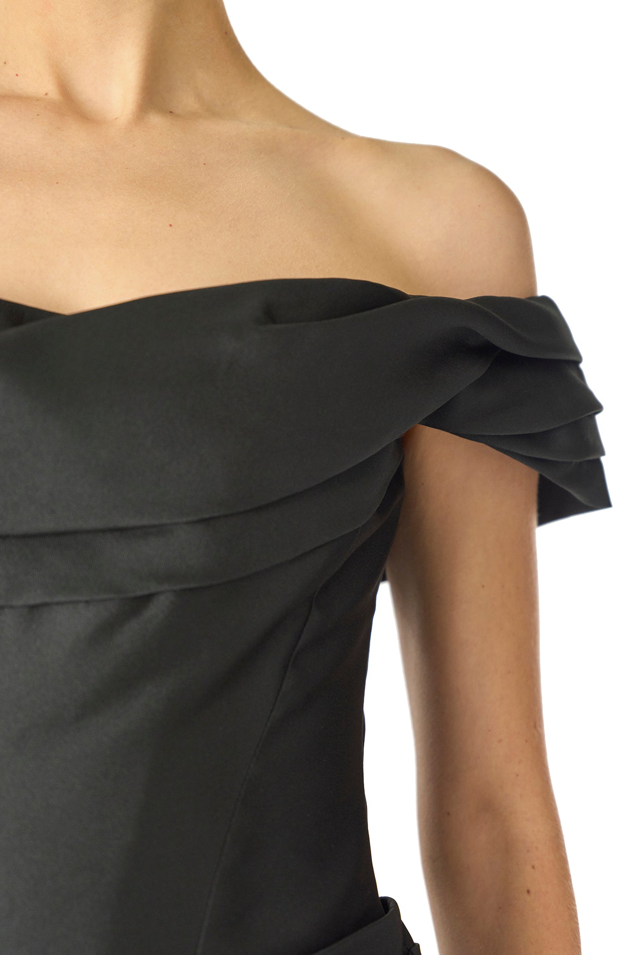 Monique Lhuillier Fall 2024 off-the-shoulder, draped gown with trumpet skirt and low back - draped neckline.