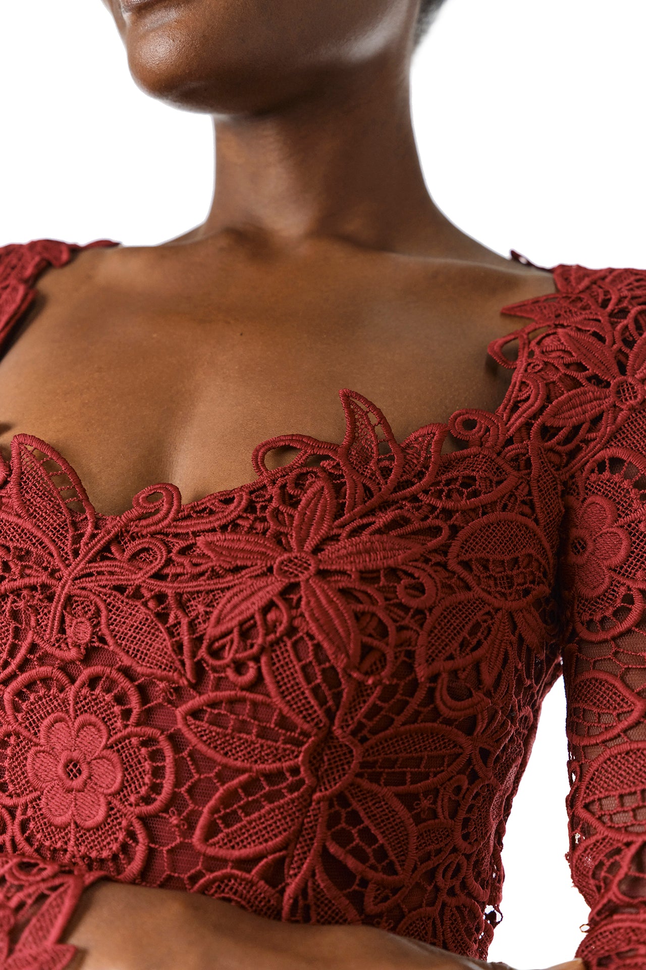 Monique Lhuillier Fall 2024 Long sleeve, scoop neck sheath in Merlot Daisy Guipure lace - neckline.