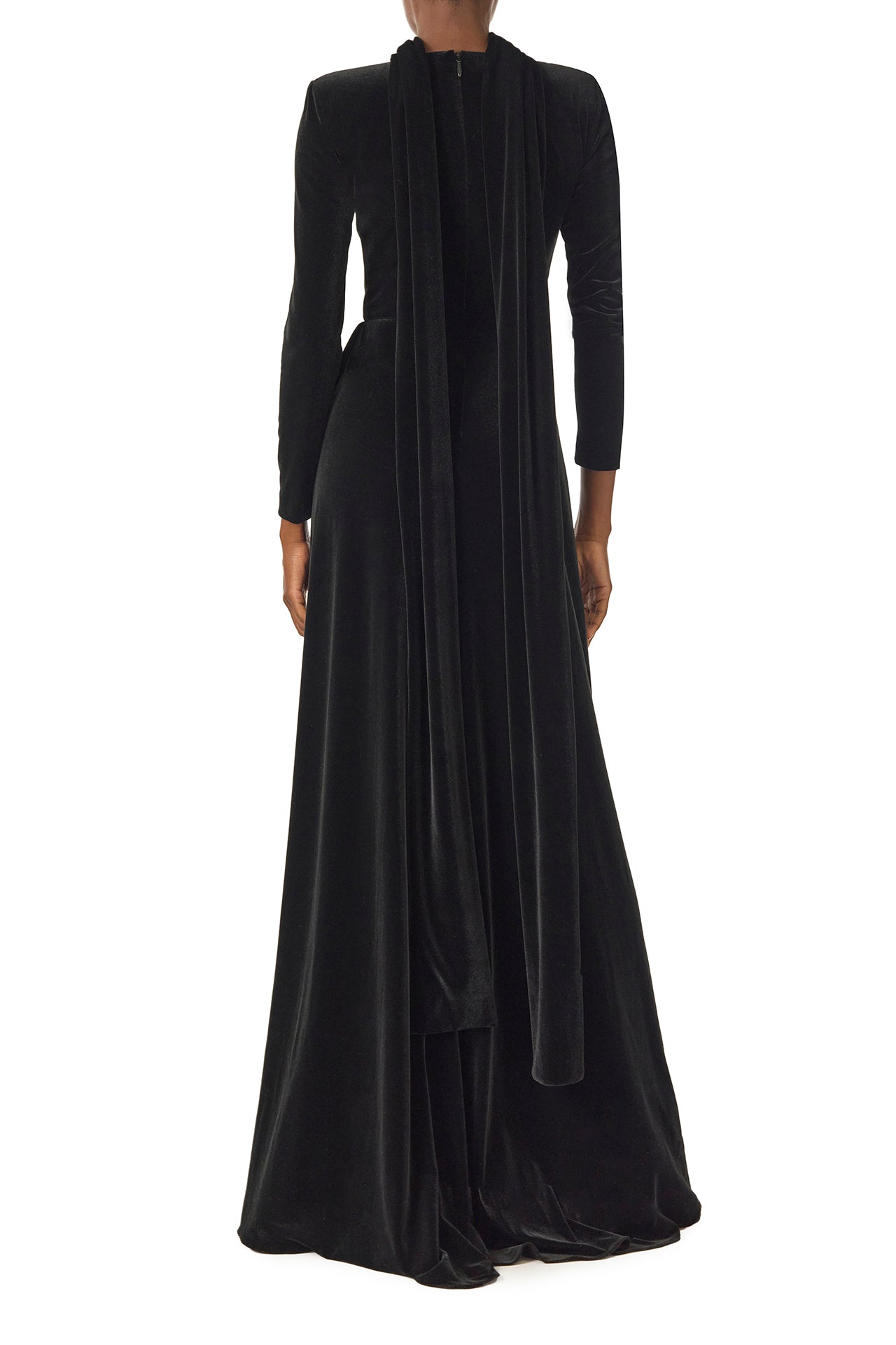Monique Lhuillier Fall 2024 long sleeve gown with square neckline, front skirt draping and detached neck scarf in noir stretch velour - back with scarf.