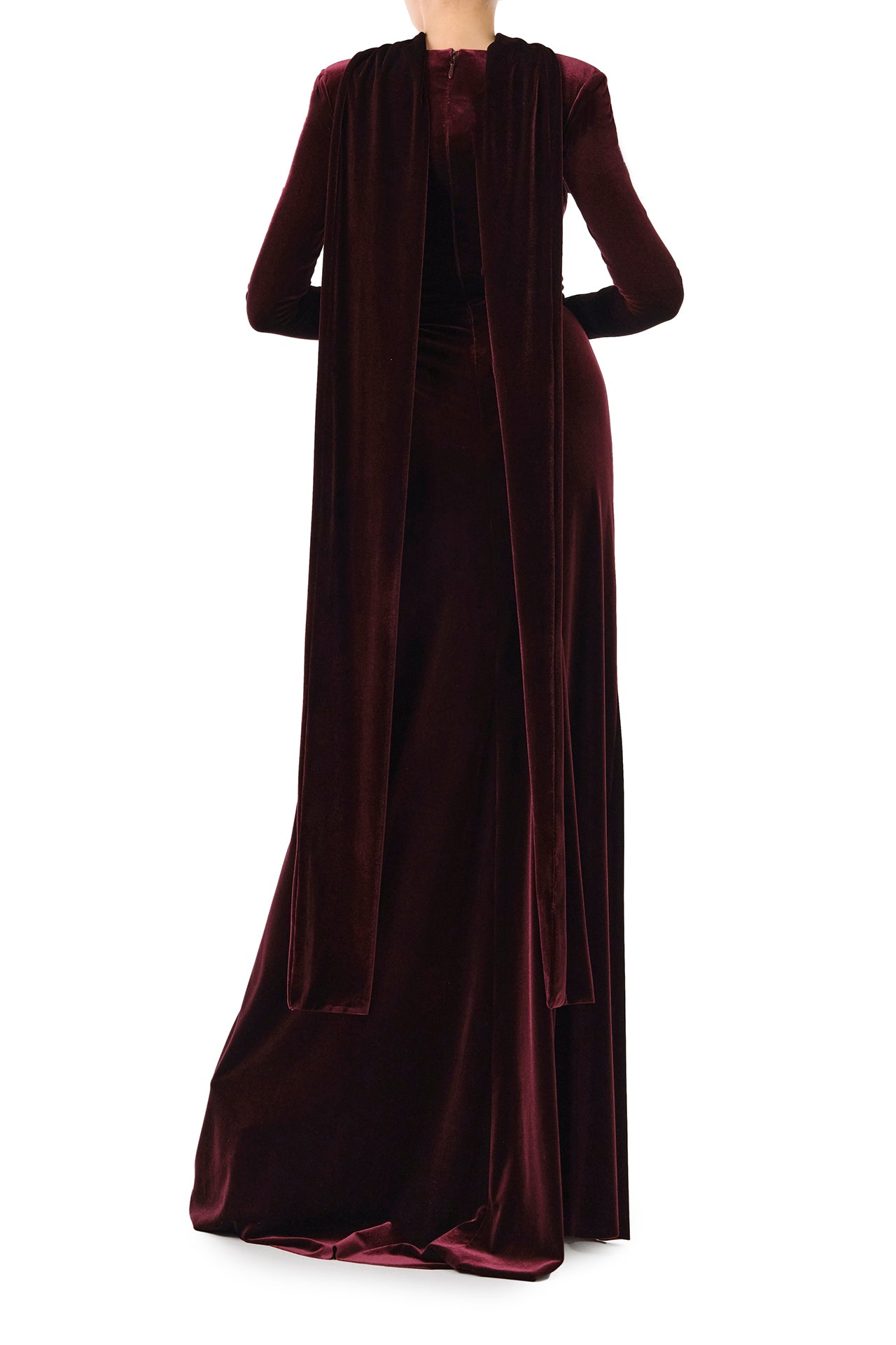 Monique Lhuillier Fall 2024 Long sleeve gown with square neckline, front skirt draping and detached neck scarf in Merlot colored stretch velour - back.