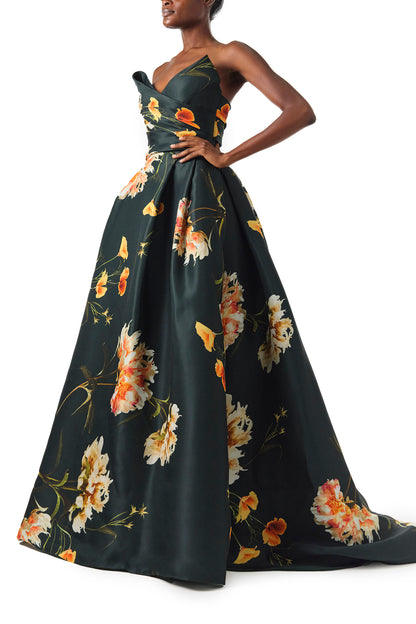 Monique Lhuillier Fall 2024 Strapless, V-neck ballgown with draped bodice, full skirt and pockets in Juniper Floral Print Gazar - side.
