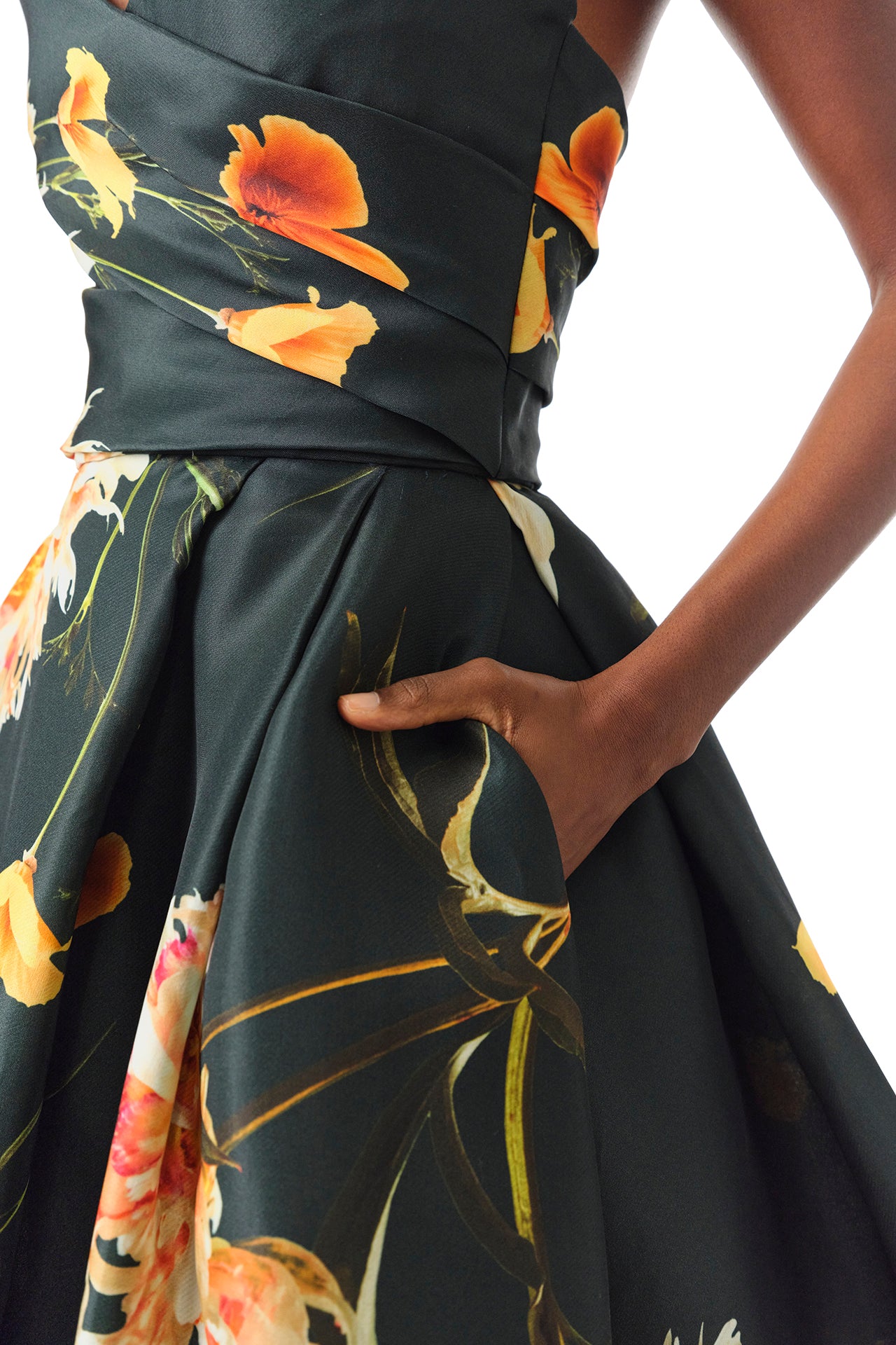 Monique Lhuillier Fall 2024 Strapless, V-neck ballgown with draped bodice, full skirt and pockets in Juniper Floral Print Gazar - pockets.