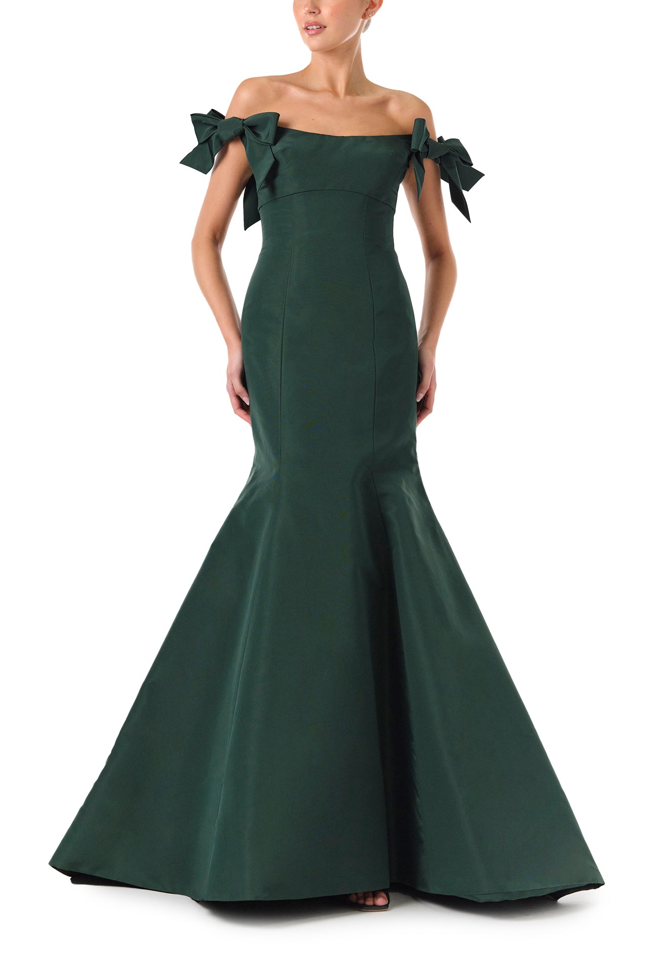 Monique Lhuillier Fall 2024 off the shoulder gown with trumpet skirt and bow sleeves in Juniper green faille fabric - front.