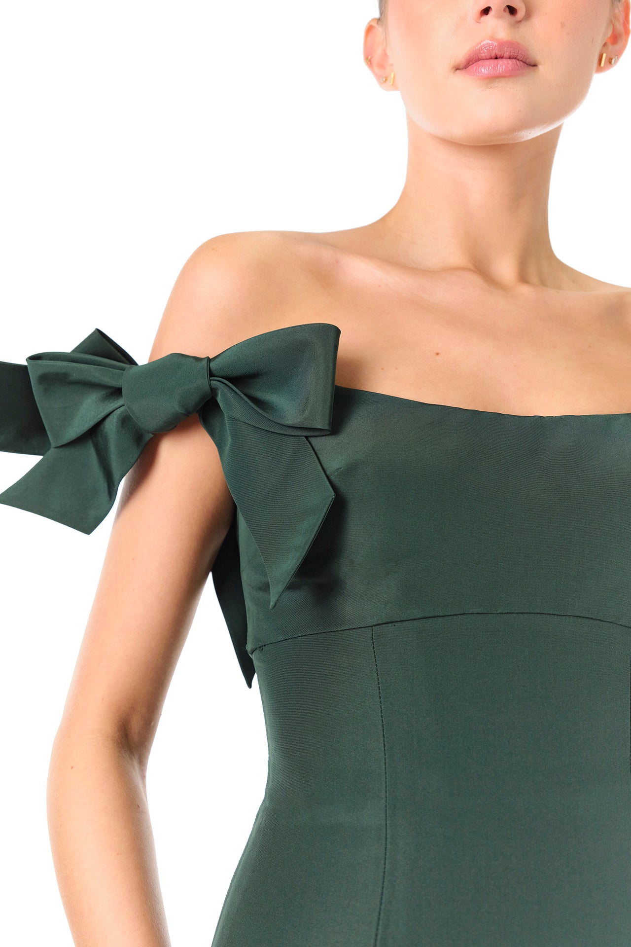 Monique Lhuillier Fall 2024 off the shoulder gown with trumpet skirt and bow sleeves in Juniper green faille fabric - bow detail.