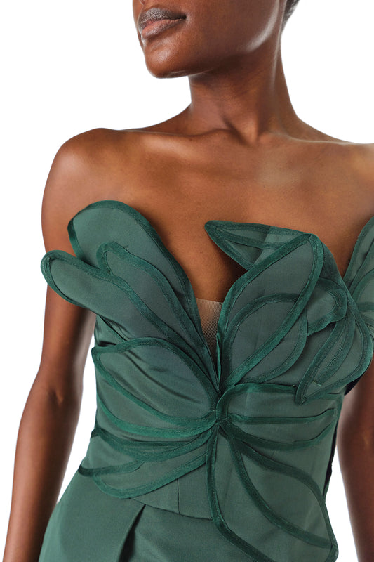 Monique Lhuillier Fall 2024 Strapless, floral embroidered column gown with asymmetric neckline and nude tulle insert in Juniper green - neckline detail.