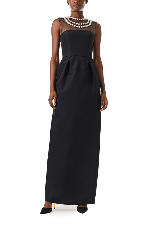 Monique Lhuillier Fall 2024 sleeveless, illusion neckline column gown in noir faille fabric with pearl embroidery and pockets - front.