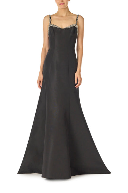 Monique Lhuillier Spring 2025 Modified trumpet gown with crystal beaded neckline and spaghetti straps in Noir Silk Faille - front.