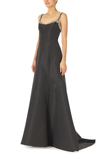 Monique Lhuillier Spring 2025 Modified trumpet gown with crystal beaded neckline and spaghetti straps in Noir Silk Faille - left side.