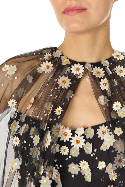 Monique Lhuillier Spring 2025 Noir tulle cape with Daisy embroidery and hook and eye closure at front of neckline - neckline.