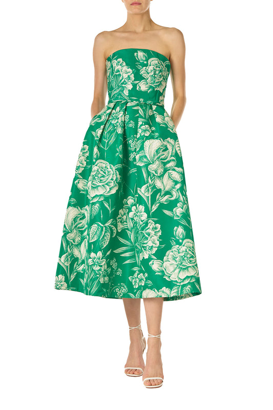 Monique Lhuillier Spring 2025 Strapless, tea-length dress with draped bodice and pockets in Grass/Silk White Floral Toile print - front.