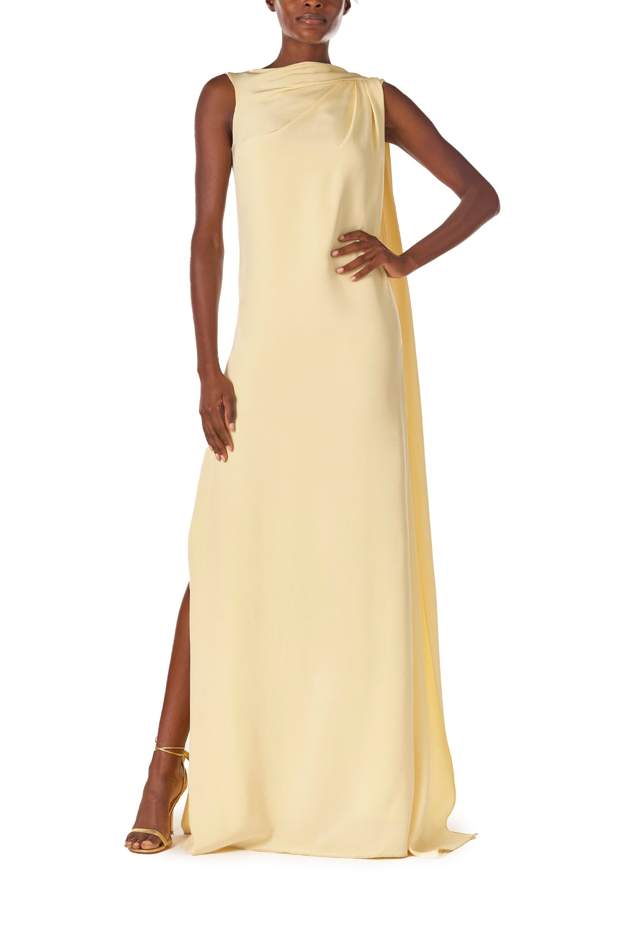 Monique Lhuillier Spring 2025 draped shoulder caftan gown with integral cape and side slit in limoncello yellow - front.