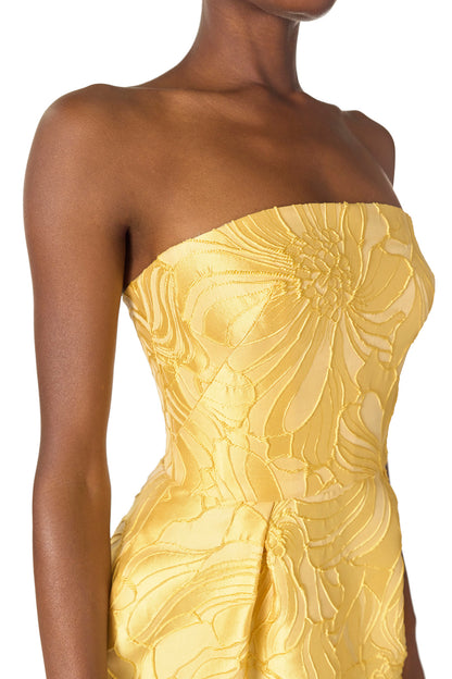 Monique Lhuillier Spring 2025 Strapless, floral jacquard cocktail dress with front pleated skirt and pockets in lemon drop color - fabric detail.