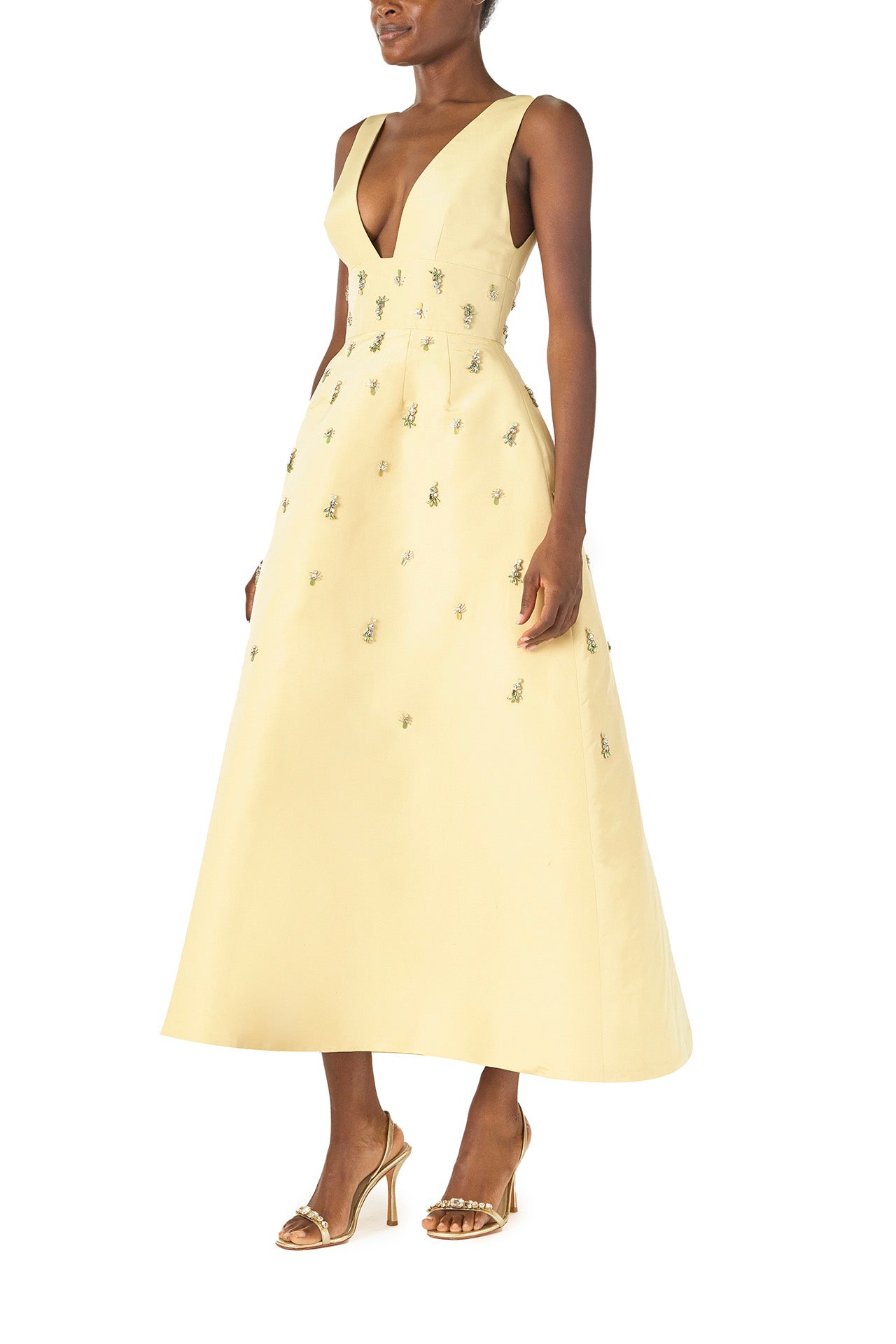Monique Lhuillier Spring 2025 Embroidered cocktail dress with v-neckline and tea-length skirt  in Limoncello faille - side.