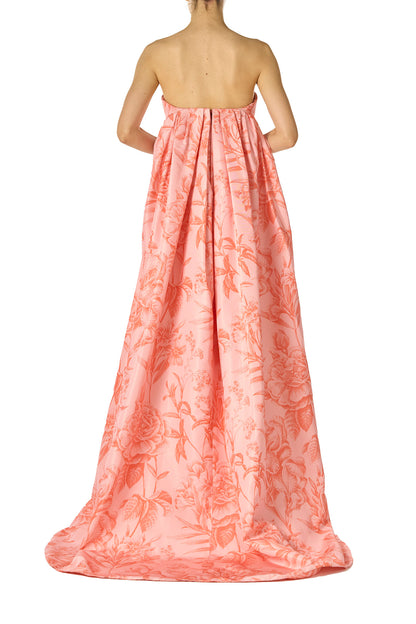 Monique Lhuillier Spring 2025 Strapless, column gown with sweeping integral train in rosette/coral colored Floral Toile Printed Faille - back.