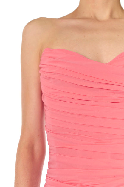 Monique Lhuillier Spring 2025 Strapless gown with draped, sweetheart neckline and front skirt slit in Crepe Jersey fabric - neckline.