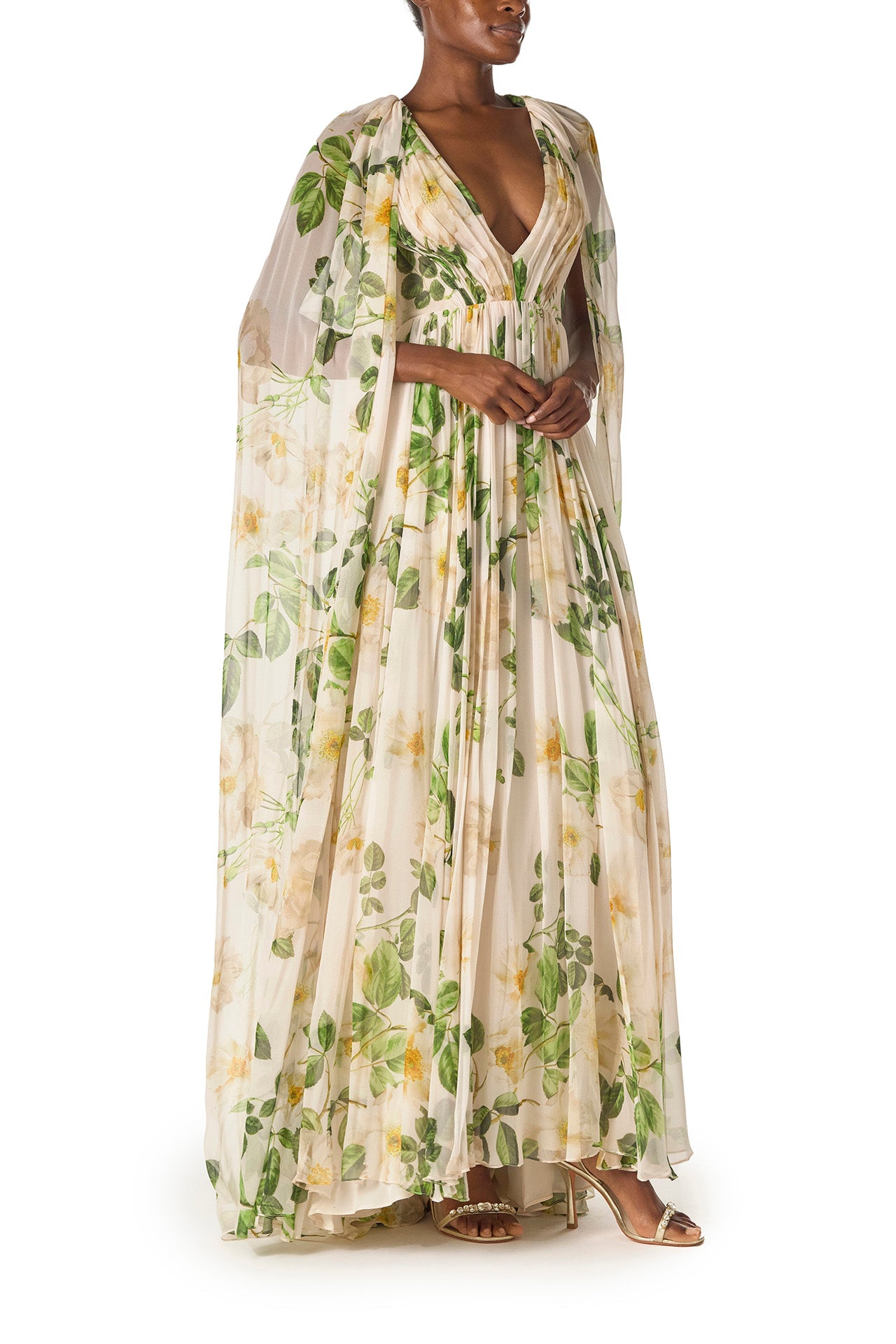 Monique Lhuillier Spring 2025 Draped, v-neck gown in Rose Printed Chiffon with low back and flowing, integral cape - right side.