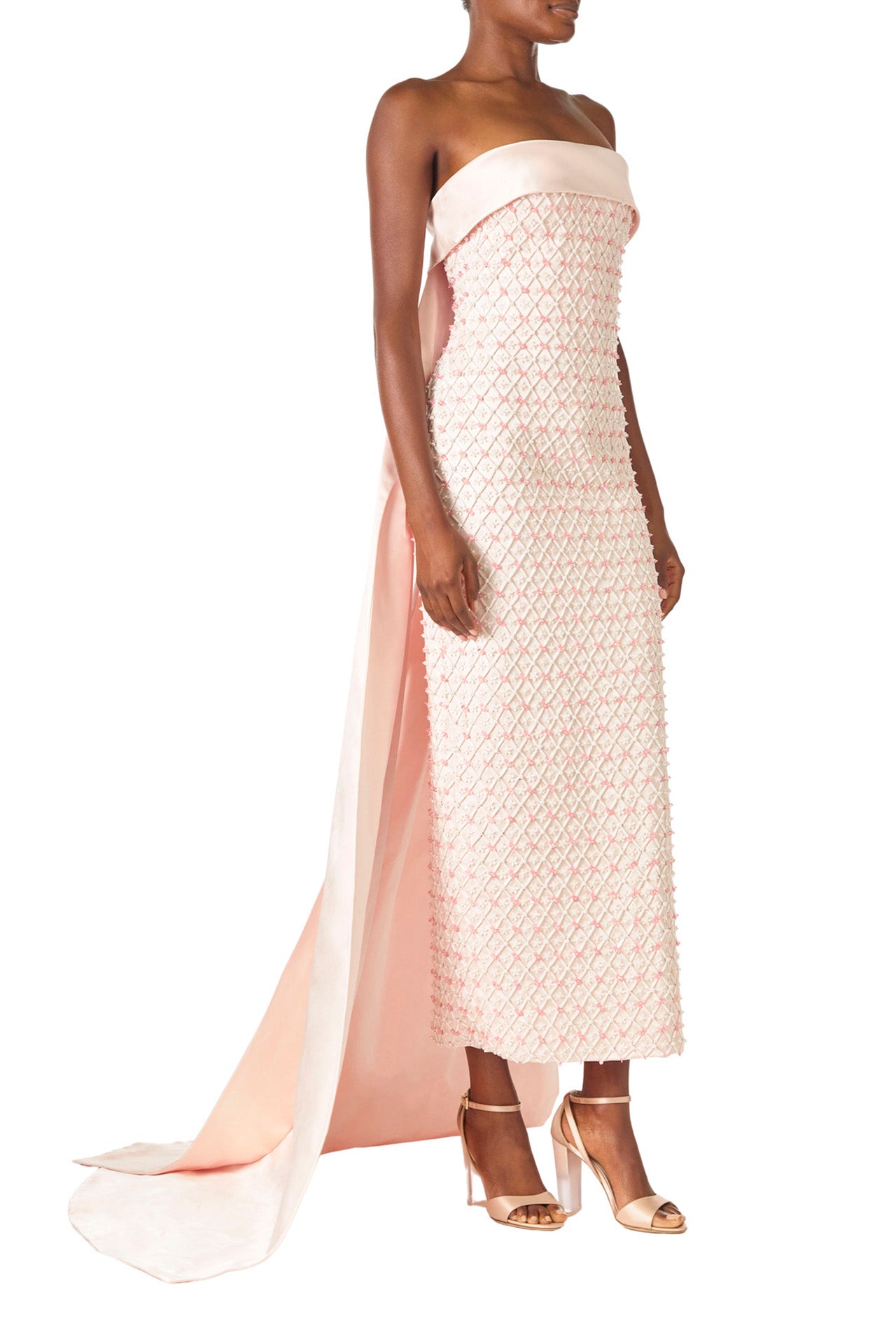 Monique Lhuillier Spring 2025 Strapless, rose embroidered satin column gown with cuffed neckline and integral draped back ties- side one.