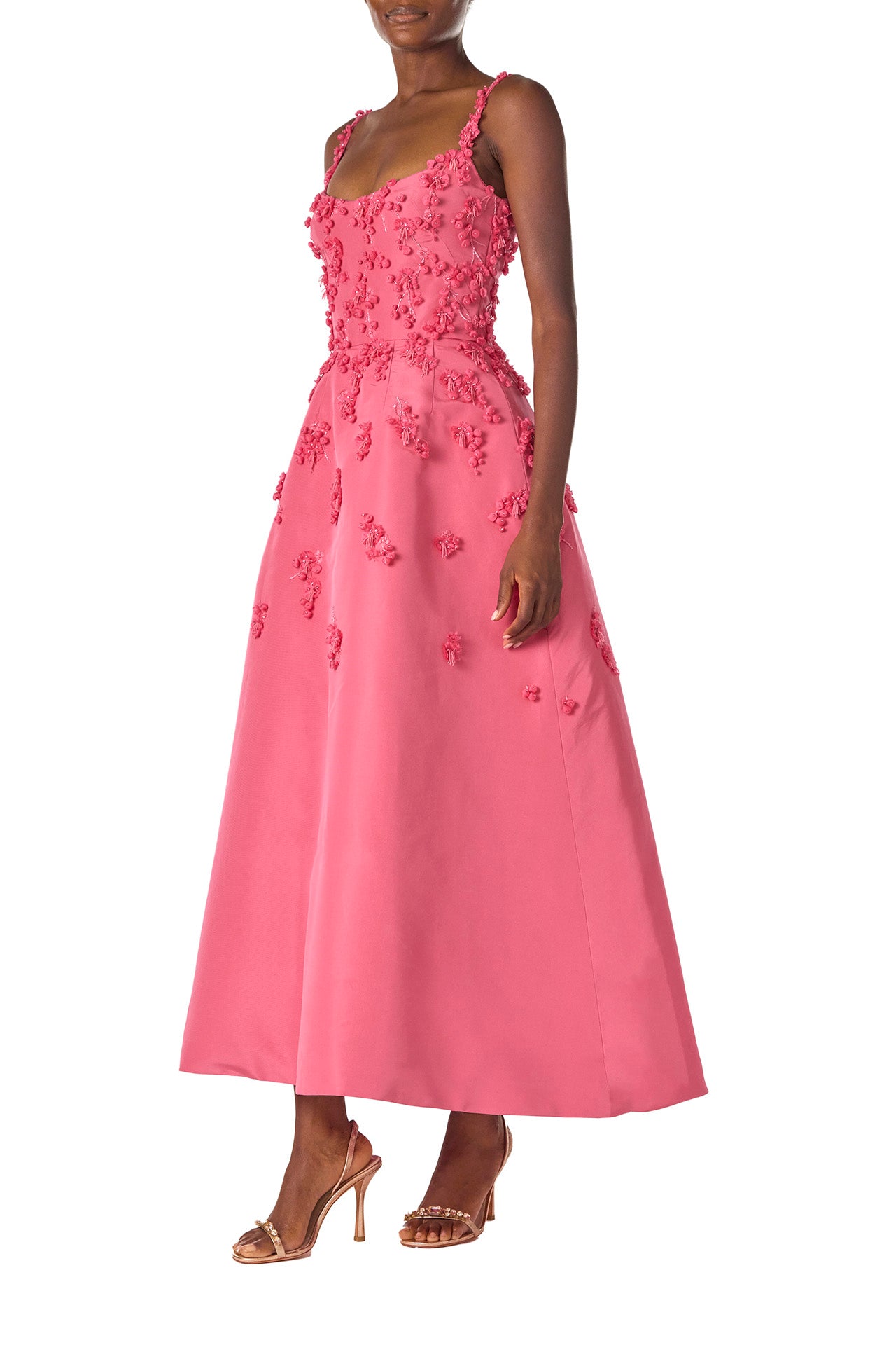 Monique Lhuillier Spring 2025 Tea-length dress with scoop neckline and spaghetti straps in Hibiscus floral embroidered faille fabric - side.