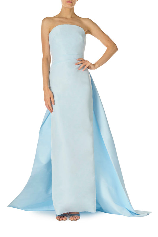 Monique Lhuillier Spring 2025 Strapless, draped column gown with attached train in Powder Blue faille fabric - front.