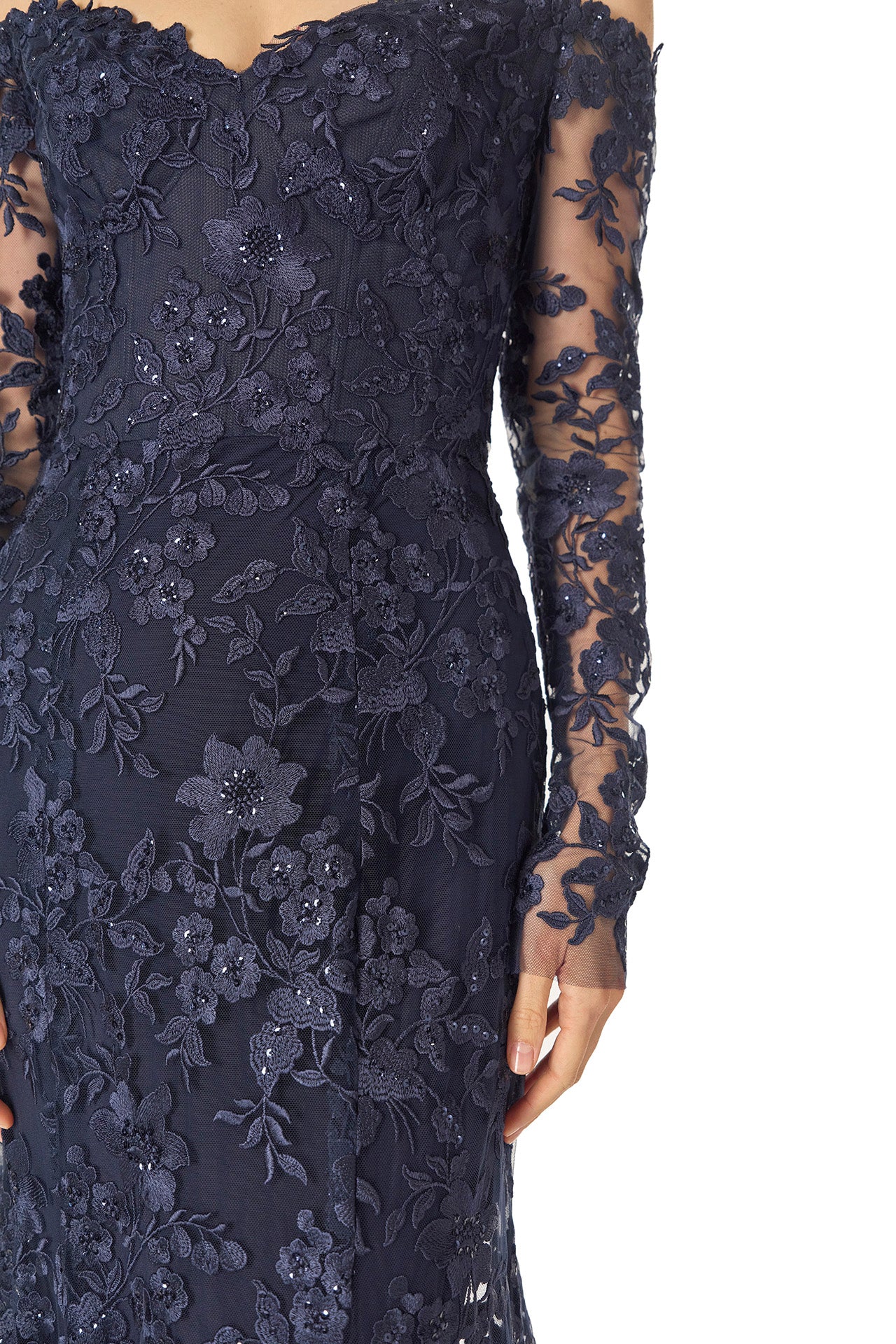 Monique Lhuillier Spring 2025 Off the shoulder, long sleeve trumpet gown with sweetheart neckline in Lapis/Noir re-embroidered tulle - fabric detail.