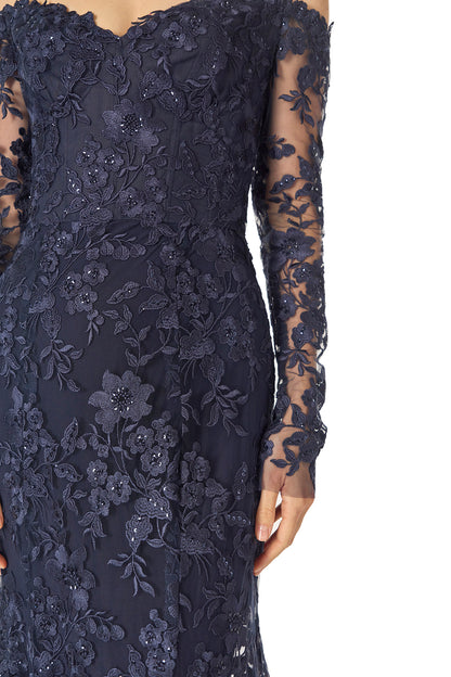Monique Lhuillier Spring 2025 Off the shoulder, long sleeve trumpet gown with sweetheart neckline in Lapis/Noir re-embroidered tulle - fabric detail.