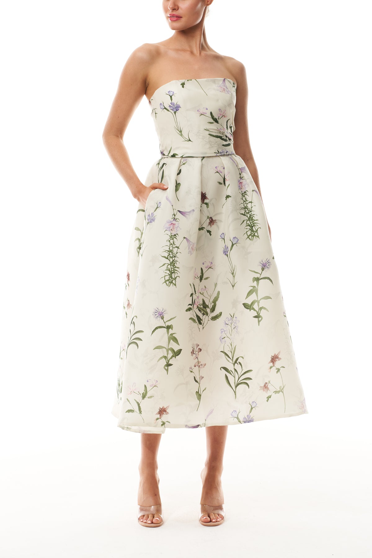 Monique Lhuillier Fall 2025 strapless dress with pleated waistline in floral printed gazar fabric - front.