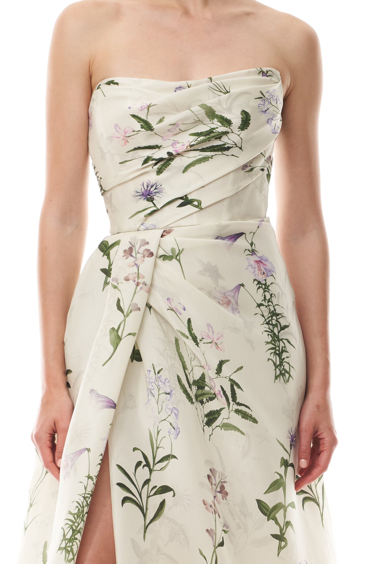 Monique Lhuillier Fall 2025 strapless, floor length gown with draped bodice and high leg slit in ivory floral multi printed gazar fabric - bodice.