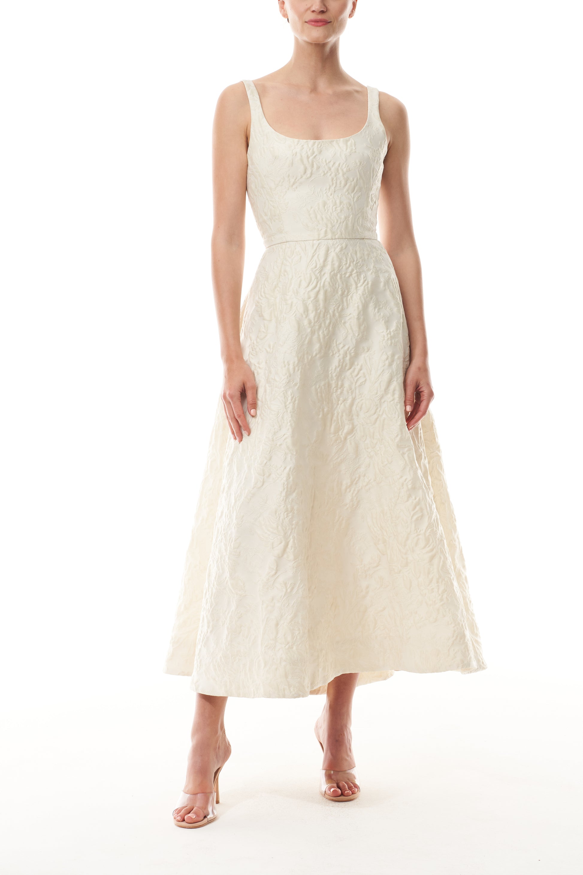 Monique Lhuillier Fall 2025 scoop neck, a-line dress in ivory floral jacquard fabric - front.