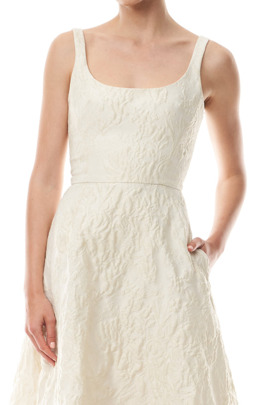 Monique Lhuillier Fall 2025 scoop neck, a-line dress in ivory floral jacquard fabric - fabric.