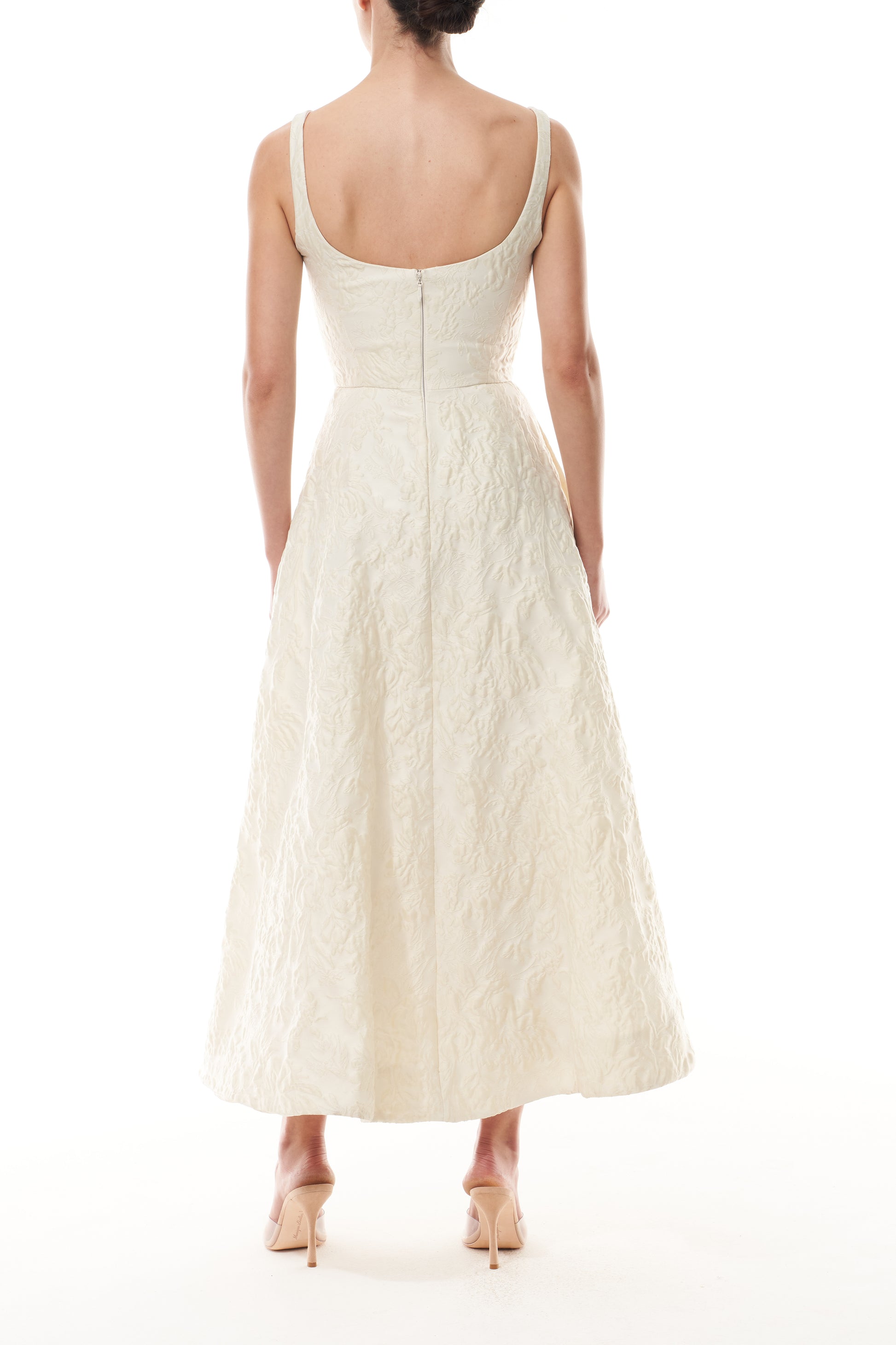 Monique Lhuillier Fall 2025 scoop neck, a-line dress in ivory floral jacquard fabric - back.