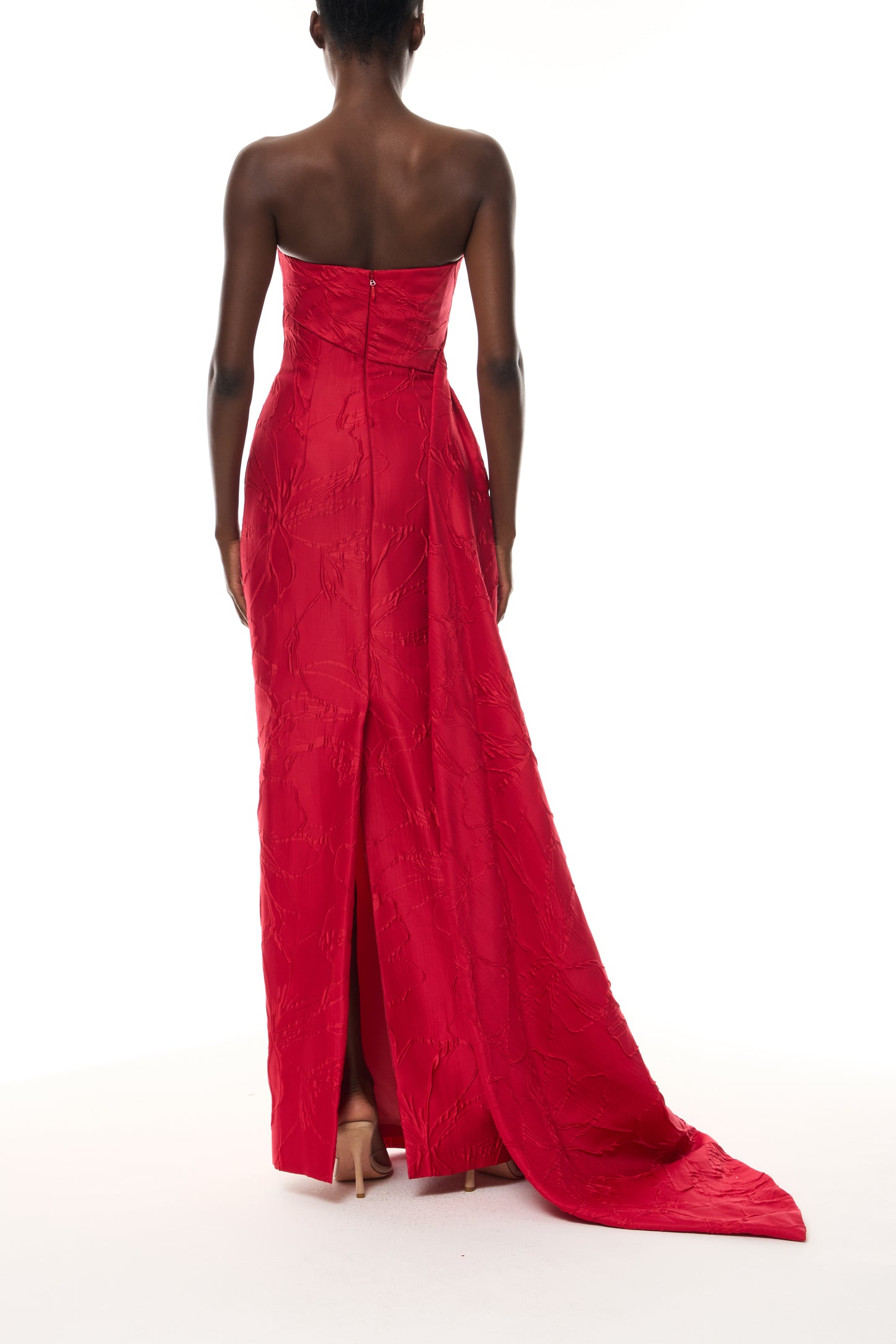 Monique Lhuillier Spring 2026 Poppy Linear Rose Jacquard Strapless Strapless draped column gown with train - back.