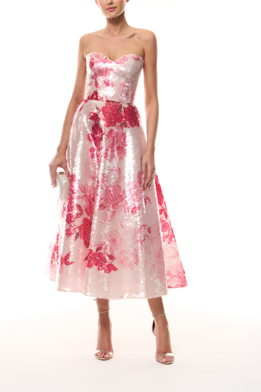 Monique Lhuillier Spring 2026 Rose Ombre Printed Sequin Pink/Multi Strapless sweetheart tea length cocktail dress - front with Crystal Dust Dasha Minaudière