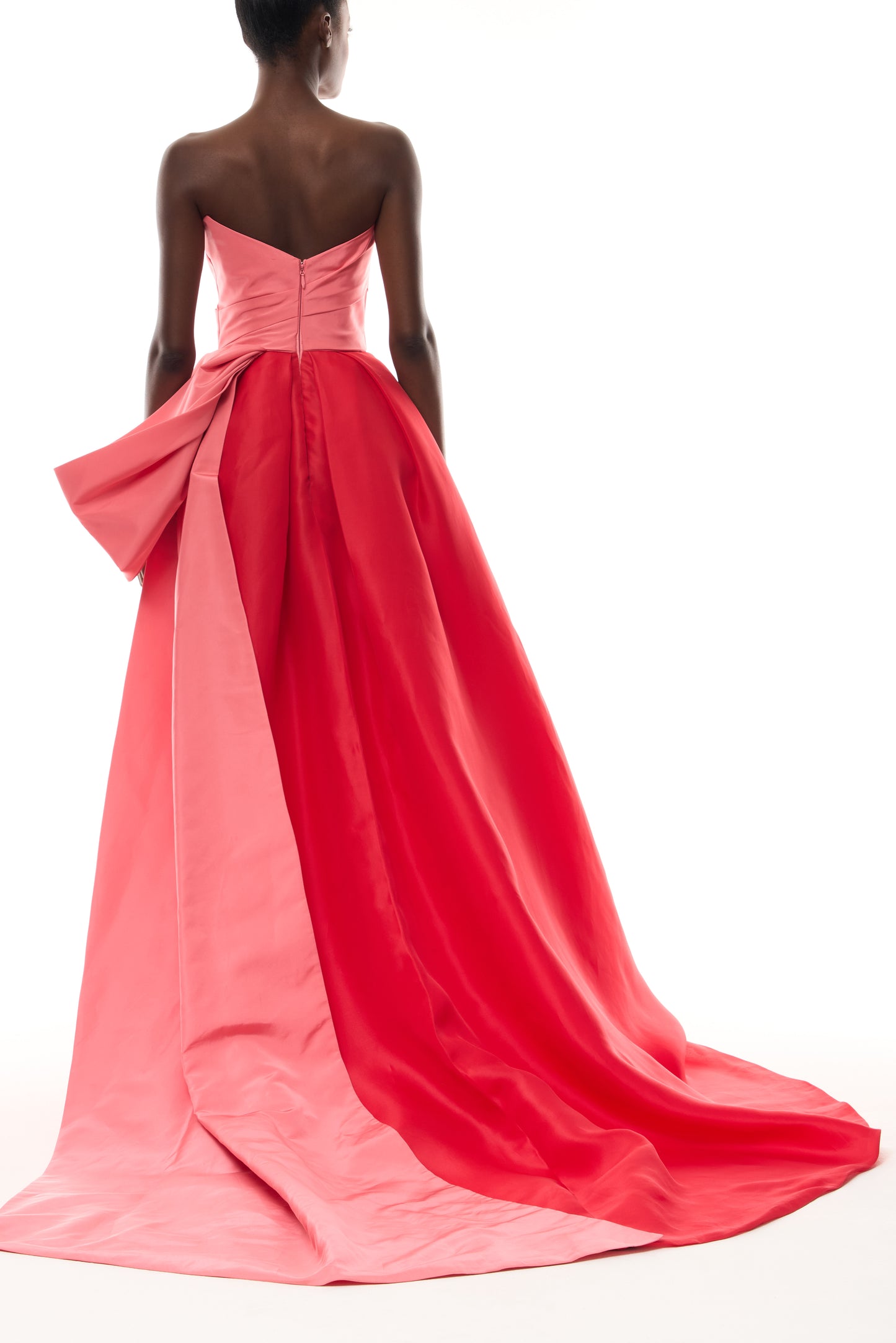 Monique Lhuillier Spring 2026  Plumeria/Poppy Faille/Gazar Strapless draped bodice gown with tufted skirt - back.