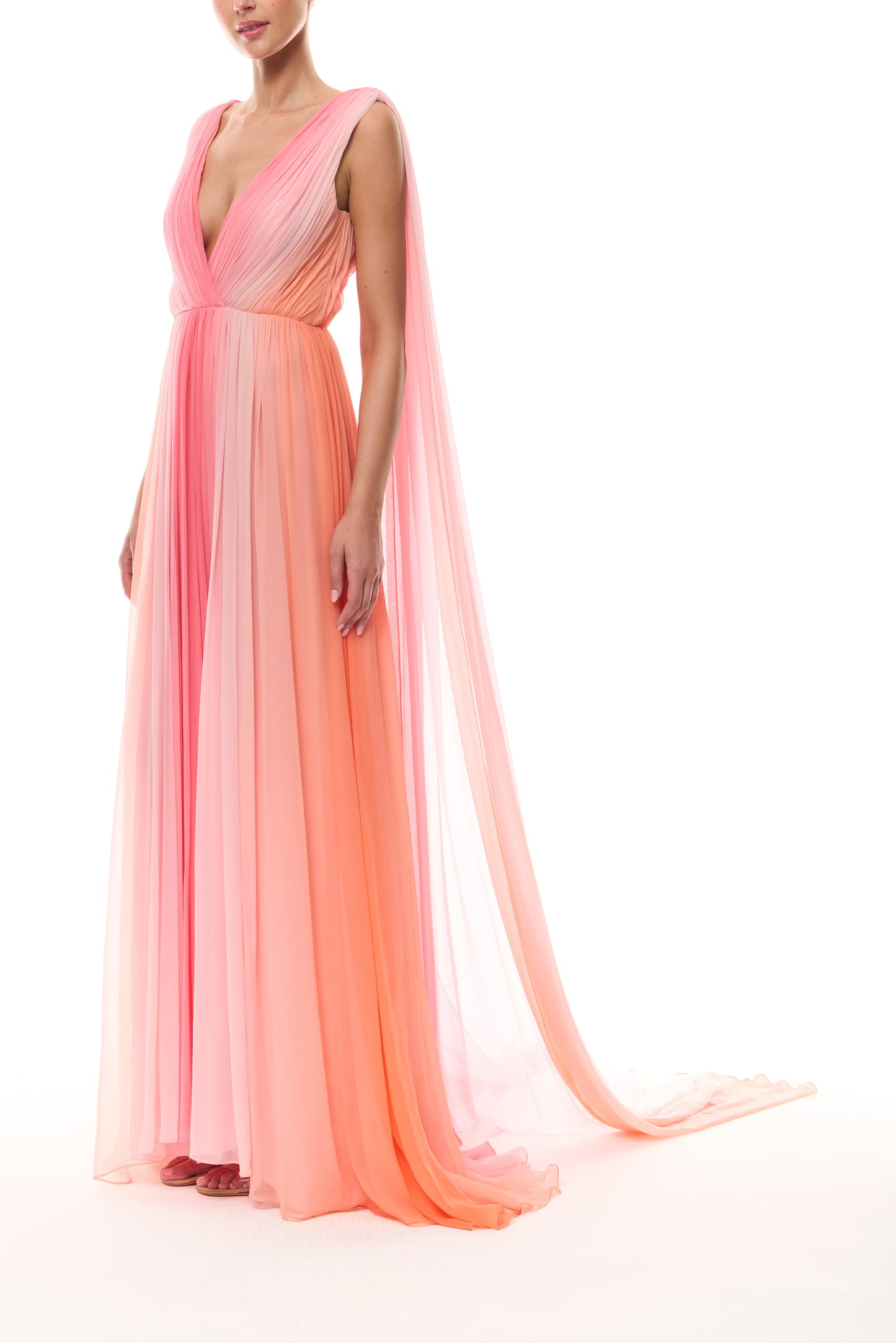 Monique Lhuillier Spring 2026 Plumeria ombre chiffon pleated v-neck gown with streamers - side.