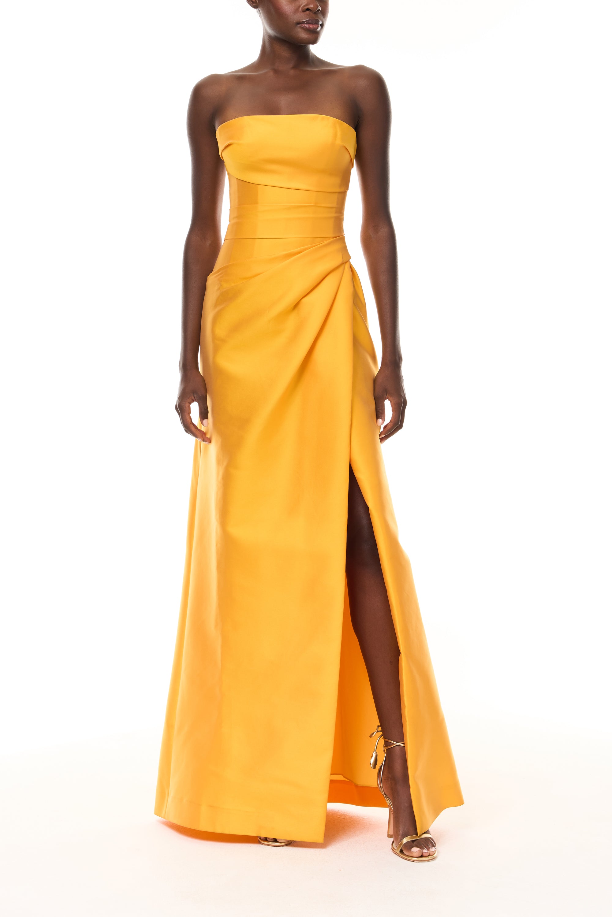Monique Lhuillier Spring 2026  Mikado Mango strapless corseted draped gown with slit - front.