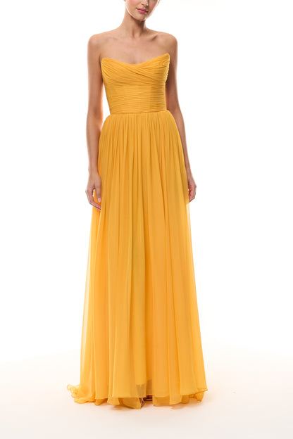 Monique Lhuillier Spring 2026 strapless Mango chiffon draped bodice gown - front.