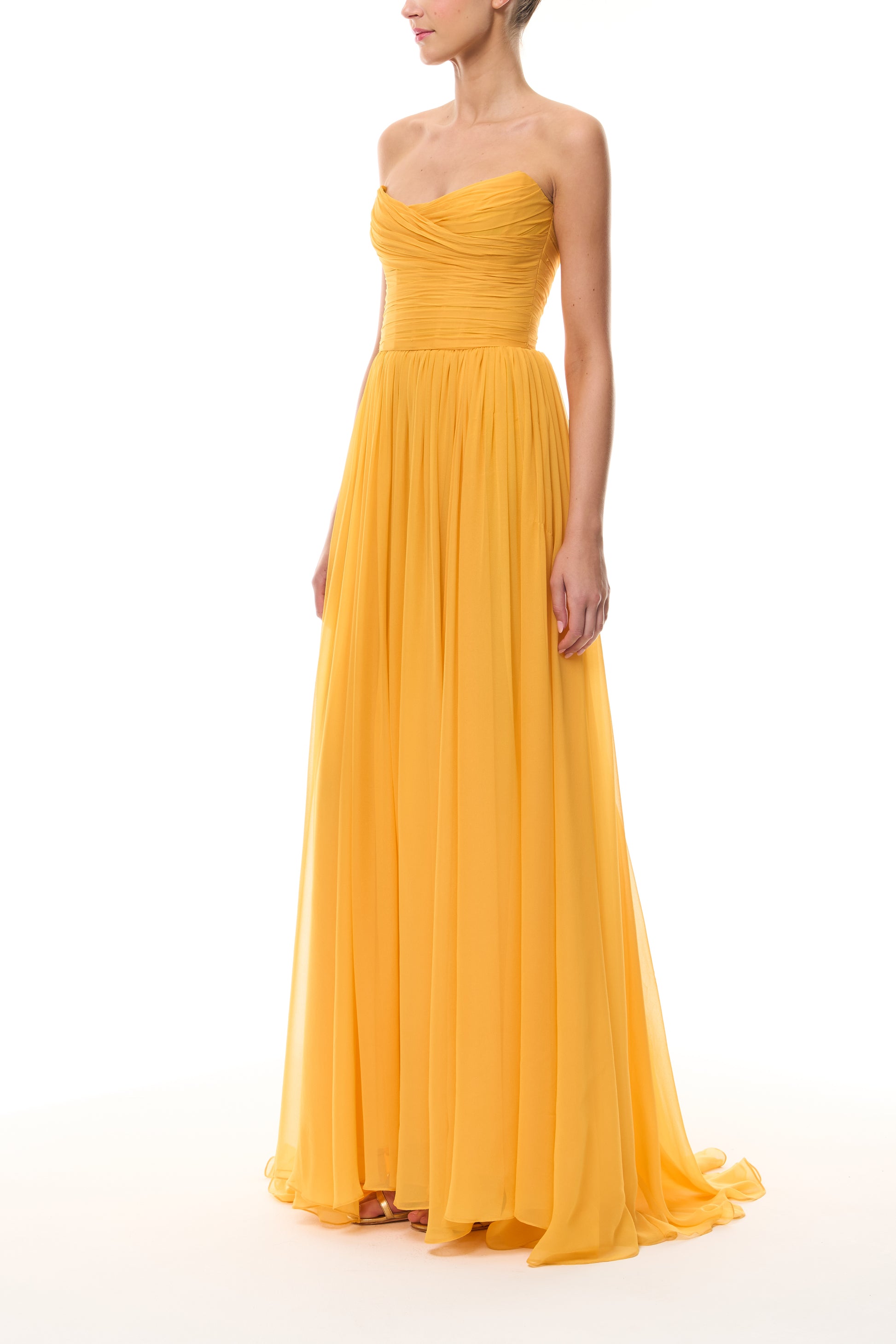 Monique Lhuillier Spring 2026 strapless Mango chiffon draped bodice gown - side.