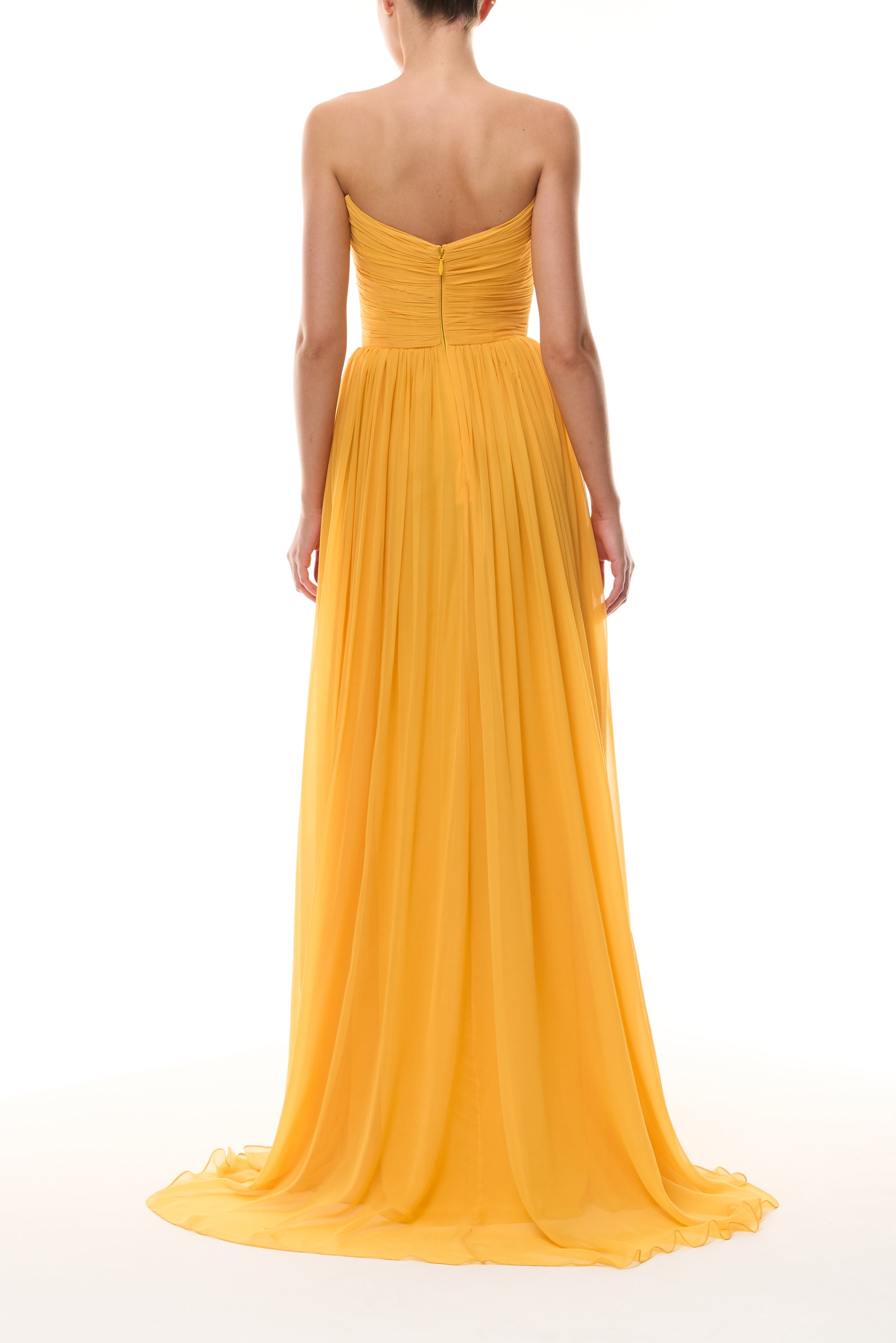 Monique Lhuillier Spring 2026 strapless Mango chiffon draped bodice gown - back.
