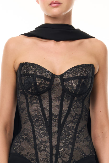 Monique Lhuillier Spring 2026 Noir lace and georgette corseted dropped waist gown with shawl - fabric. 