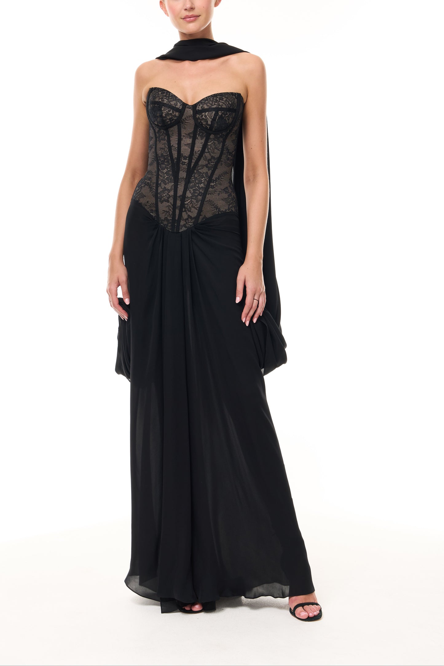 Monique Lhuillier Spring 2026 Noir lace and georgette corseted dropped waist gown with shawl - front.