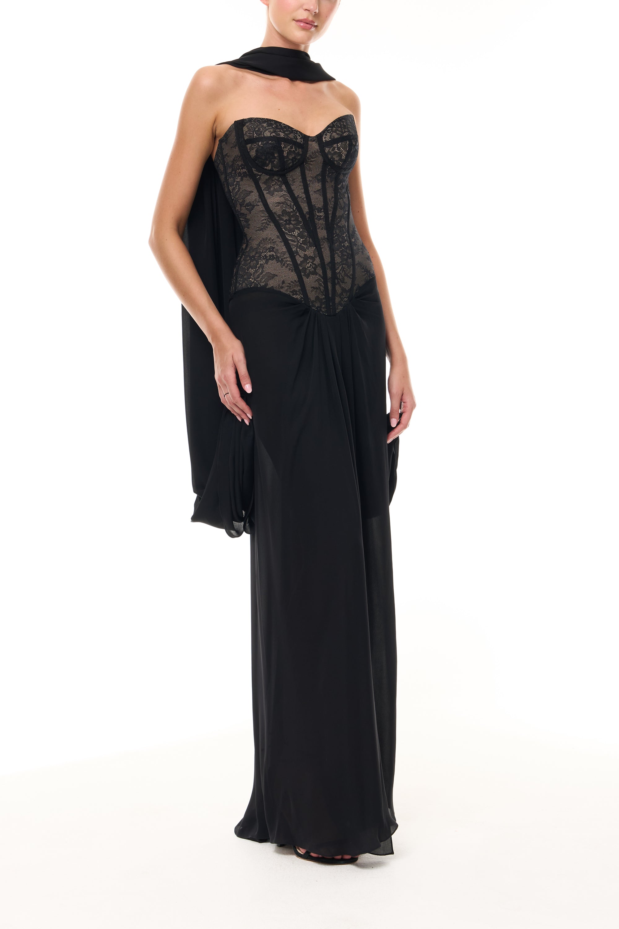 Monique Lhuillier Spring 2026 Noir lace and georgette corseted dropped waist gown with shawl - side.