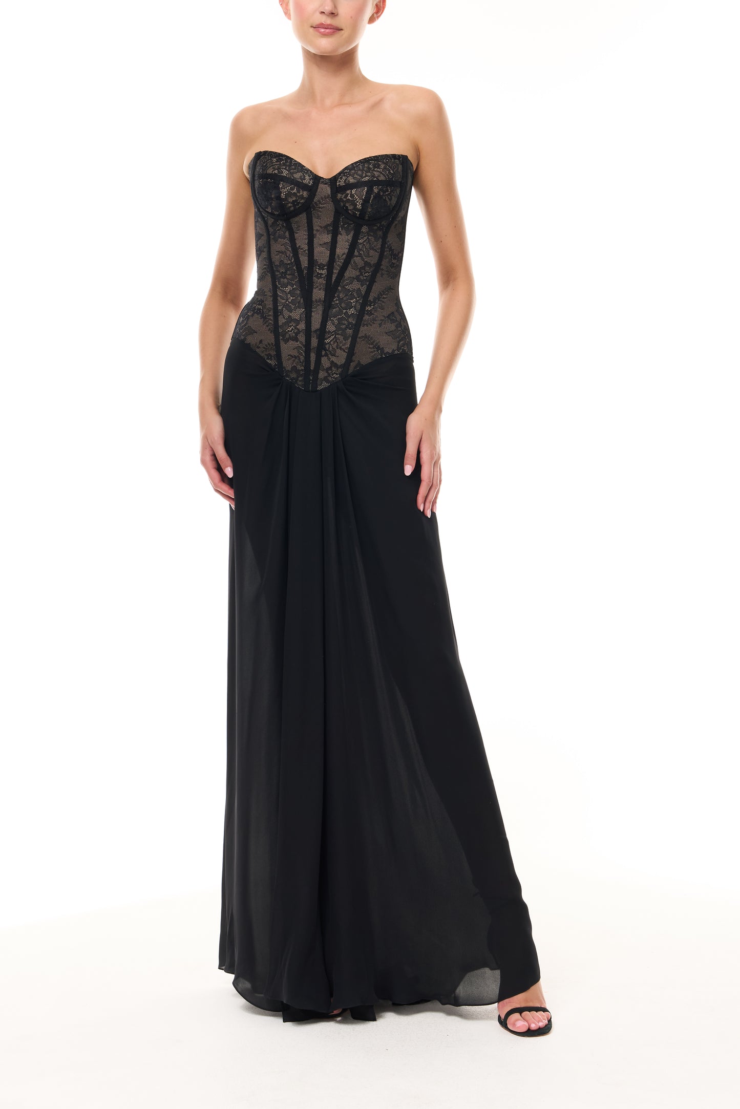 Monique Lhuillier Spring 2026 Noir lace and georgette corseted dropped waist gown - front.