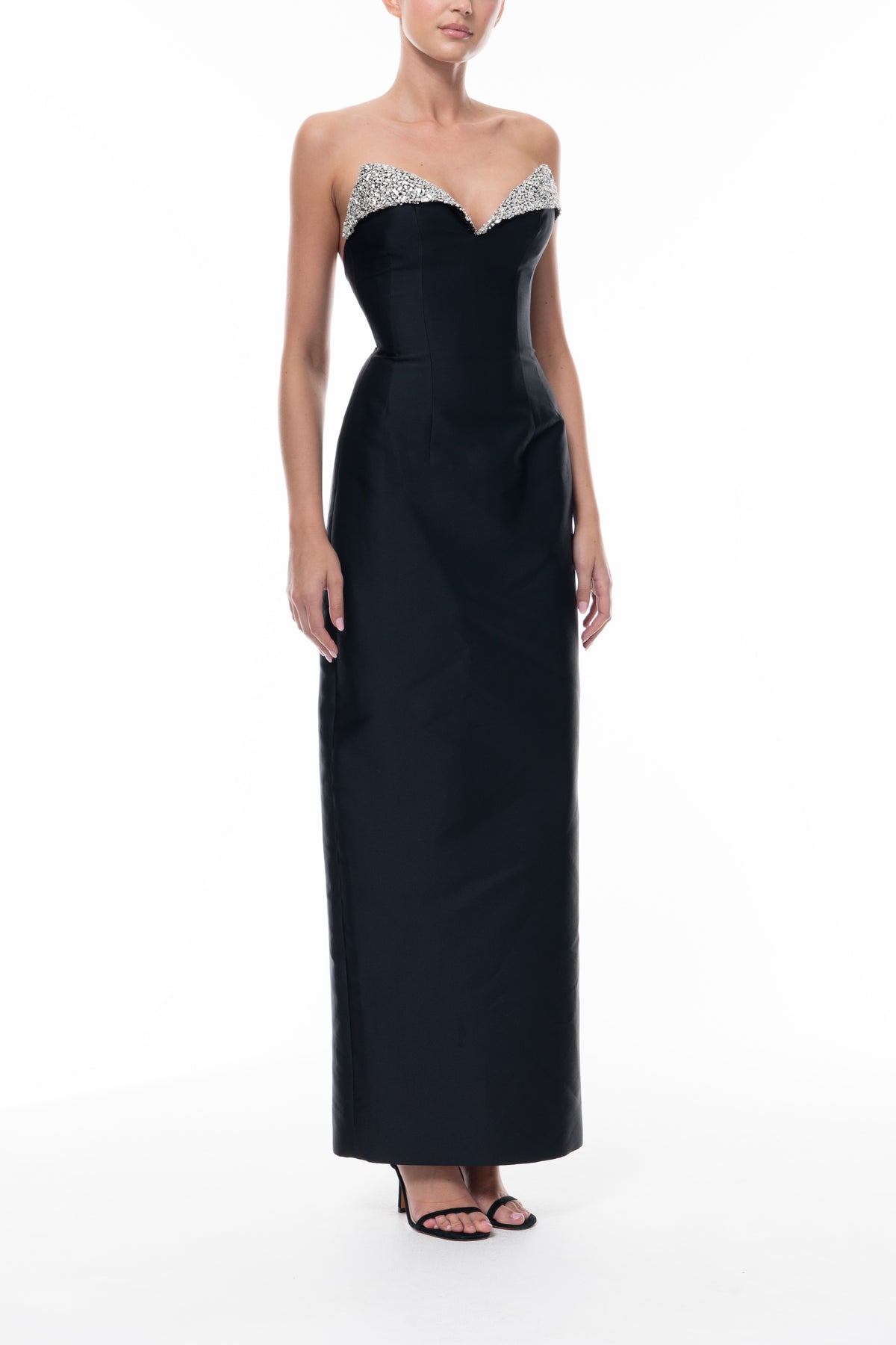 Monique Lhuillier Spring 2026 Noir Mikado Embroidered lapel column gown - side.