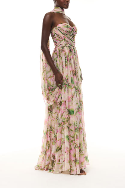 Monique Lhuillier Spring 2026 Carnation Multi Small Tulip Printed Chiffon Sweetheart strapless pleated gown with
shawl - side.